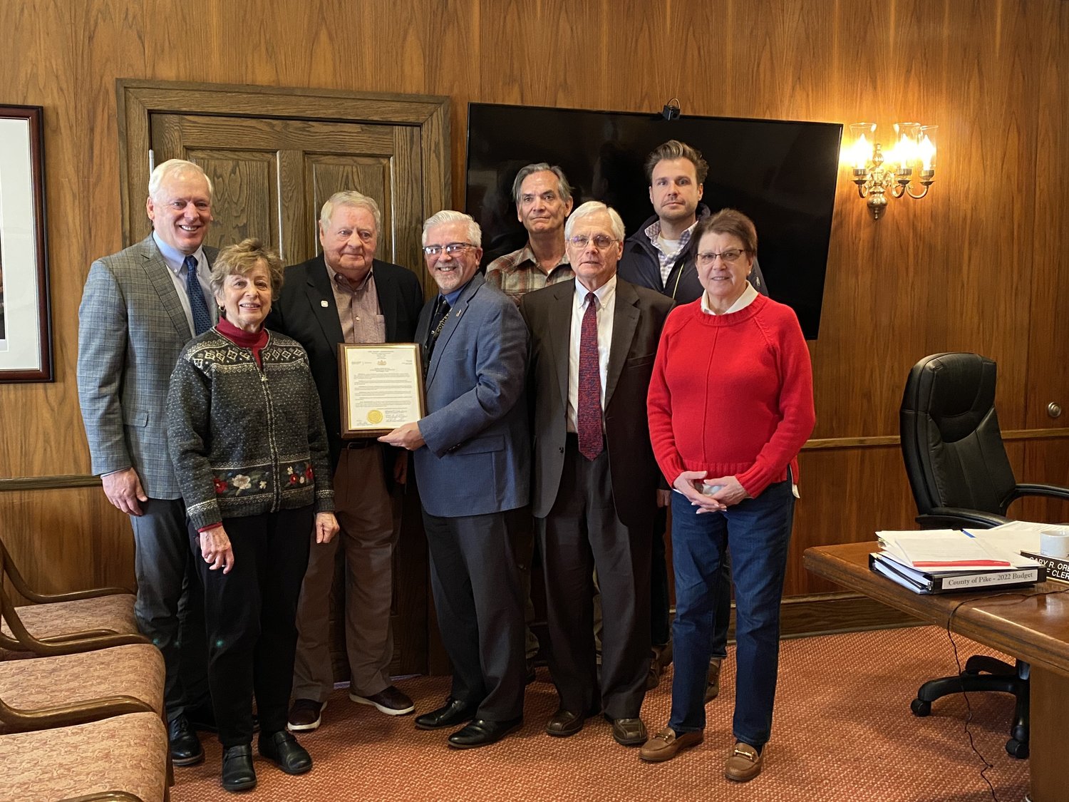 The Pike County Commissioners have recognized Greater Pike Community Foundation’s co-founder and board chair, Jim Pedranti with a resolution of accomplishment. From left: Commissioner Ronald Schmalzle, GPCF Board Secretary Roseann Kalish, GPCF Board Chair Jim Pedranti, Commissioner Chair Matt Osterberg, GPCF Board member Mayor Sean Strub, commissioner Steve Guccini, GPCF Board member Luke Turano, and GPCF Board Member Maryanne Monte.